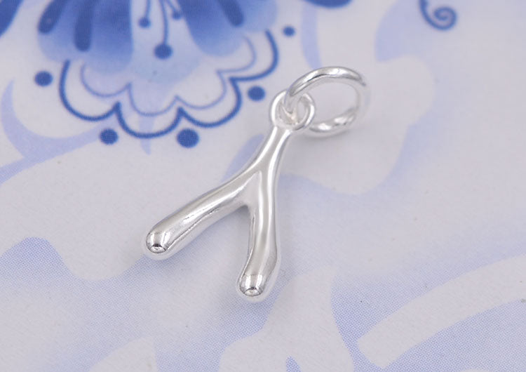 Sterling Silber Winziger Glücksknochen-Charm-Anhänger S925