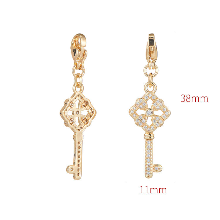 Pendentif à breloque 2 clés avec fermoir mousqueton orné de strass 14K GF